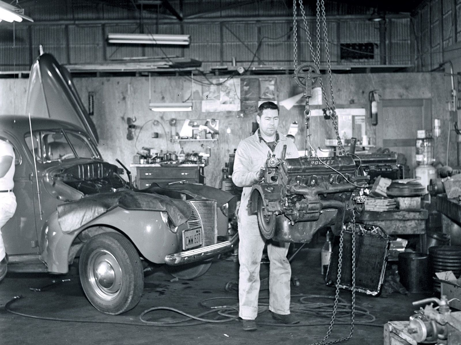 Mechanic performing engine repair - ASE certified auto repair Chicago